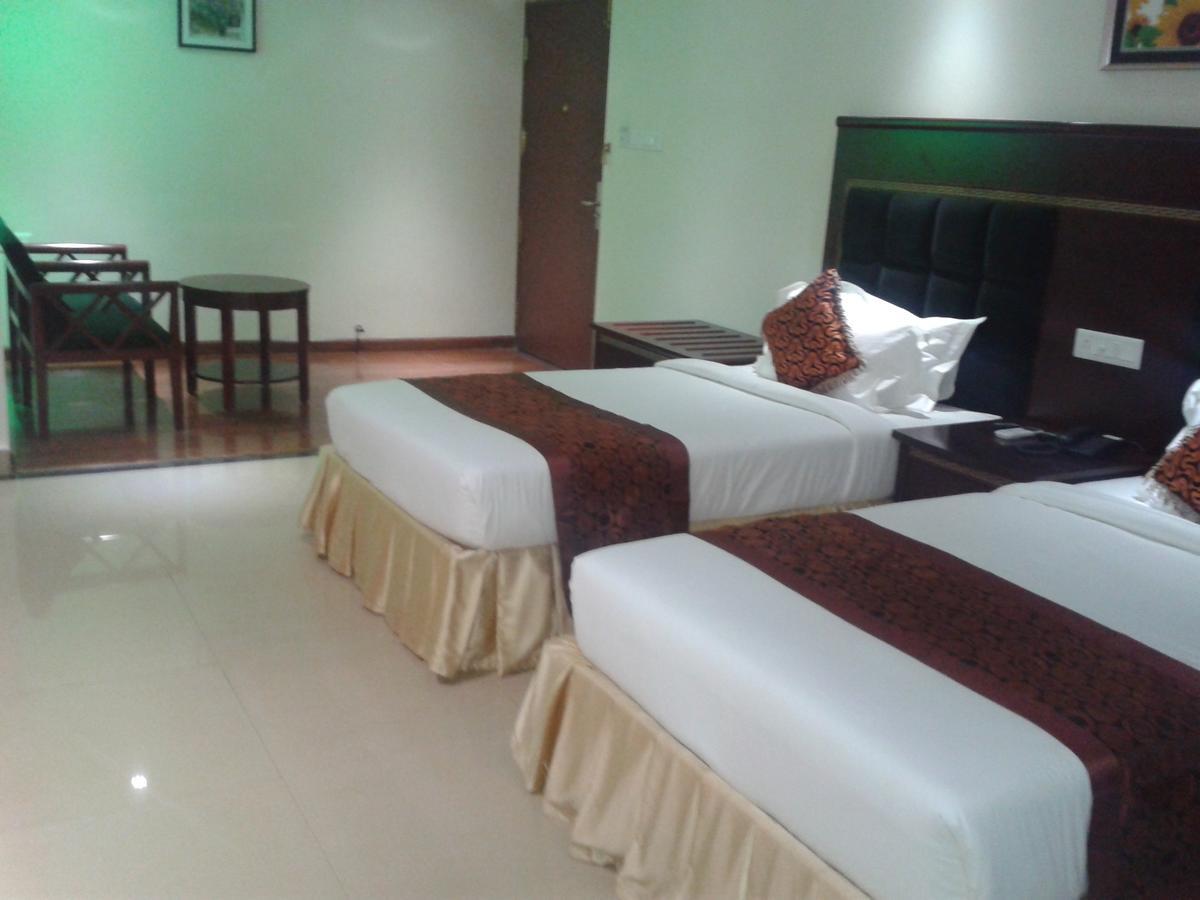 Hotel Hiton Perintalmanna Chambre photo